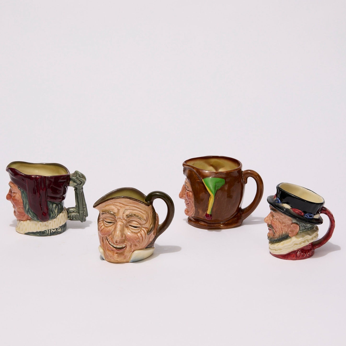 ROYAL DOULTON | CHARACTER JUGS  (set of 4)